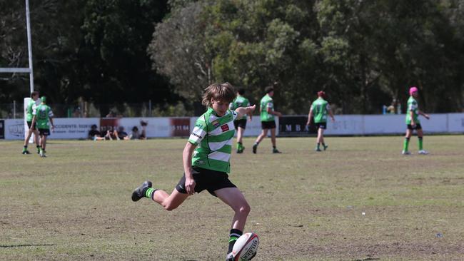 Action galleries of the junior rugby union grand finals, match played at Surfers Paradise Home Ground. Gold Coast Eagles Vs Currumbin Alligators under 16s division. Currumbin player 9 Ryan Wildman. Picture Mike Batterham