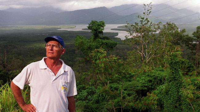 Vince Vitale at the Hinchinbrook Lookout and his backyard in 2000. Picture: Evan Morgan