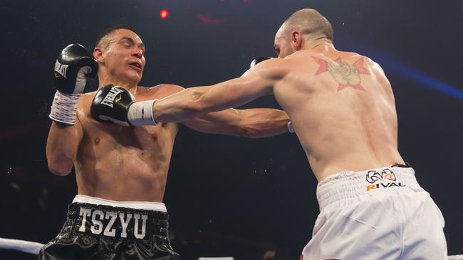 Joel Camilleri lands a punch on Tim Tszyu during their Super Welterweight Title bout. Picture: AAP