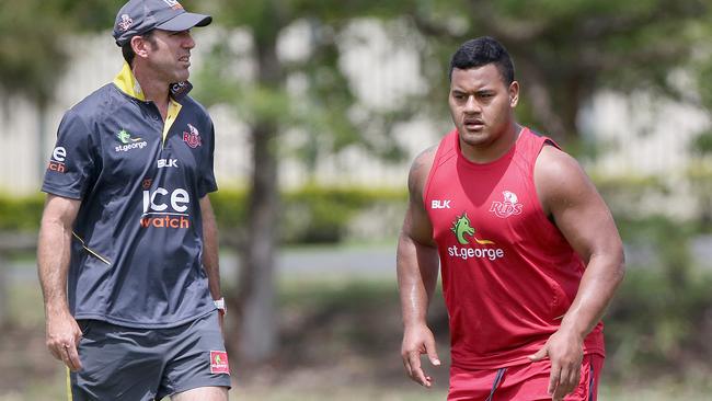 Taniela Tupou trains in front of Reds coach Richard Graham at Ballymore.