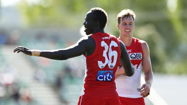 Aliir Aliir of the Swans surprised as a ruckman in the preseason hit-out against the Suns