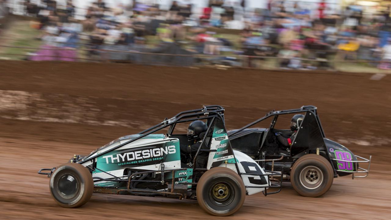 Toowoomba Wingless Sprintcar driver Tim Harris makes an inside pass at Archerfield Speedway. Picture: Michael Stead Photography