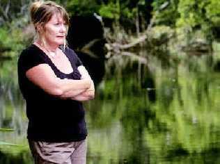 Looking at the floodwater run-off from surrounding farms Jancine Harrison, of Woodburn, says another fish kill is on the way. Picture: Jay Cronan