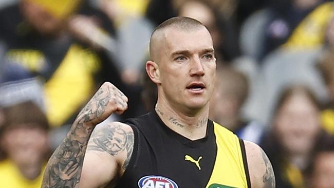 MELBOURNE, AUSTRALIA - AUGUST 19: Dustin Martin of the Tigers celebrates kicking a goal during the round 23 AFL match between Richmond Tigers and North Melbourne Kangaroos at Melbourne Cricket Ground, on August 19, 2023, in Melbourne, Australia. (Photo by Daniel Pockett/Getty Images)