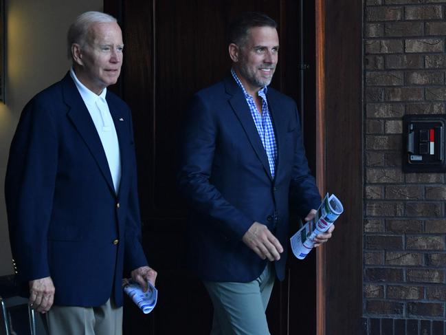 Joe and Hunter Biden after attending mass in Johns Island. Picture: Nicholas Kamm/AFP