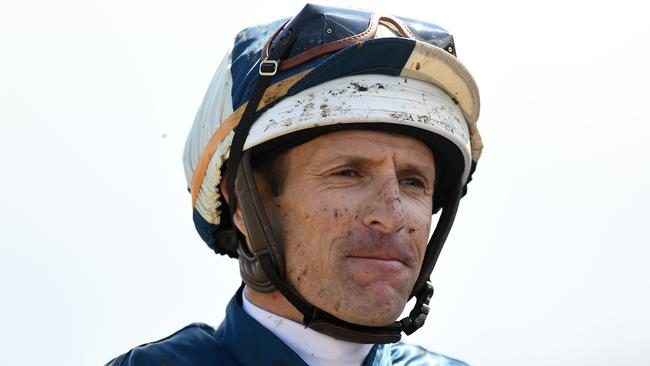 Hugh Bowman returns to the mounting yard after finishing second on Marmelo. Pic: AAP