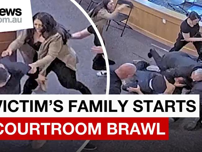 Wild footage of victim's uncle attacking murder suspect in court