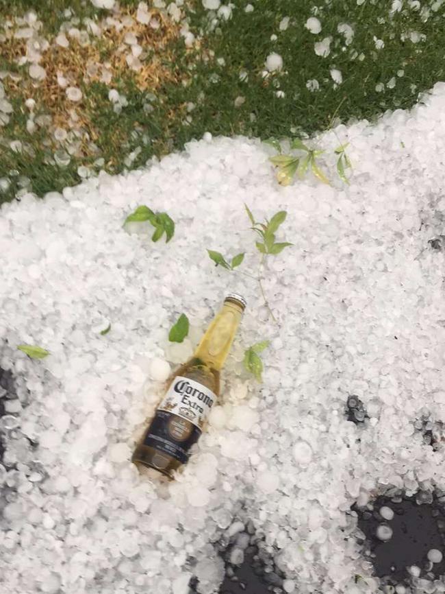 Reader Chris Massarotti says he is using the huge hail in his Templestowe backyard for a purpose. Picture: Chris Massarotti