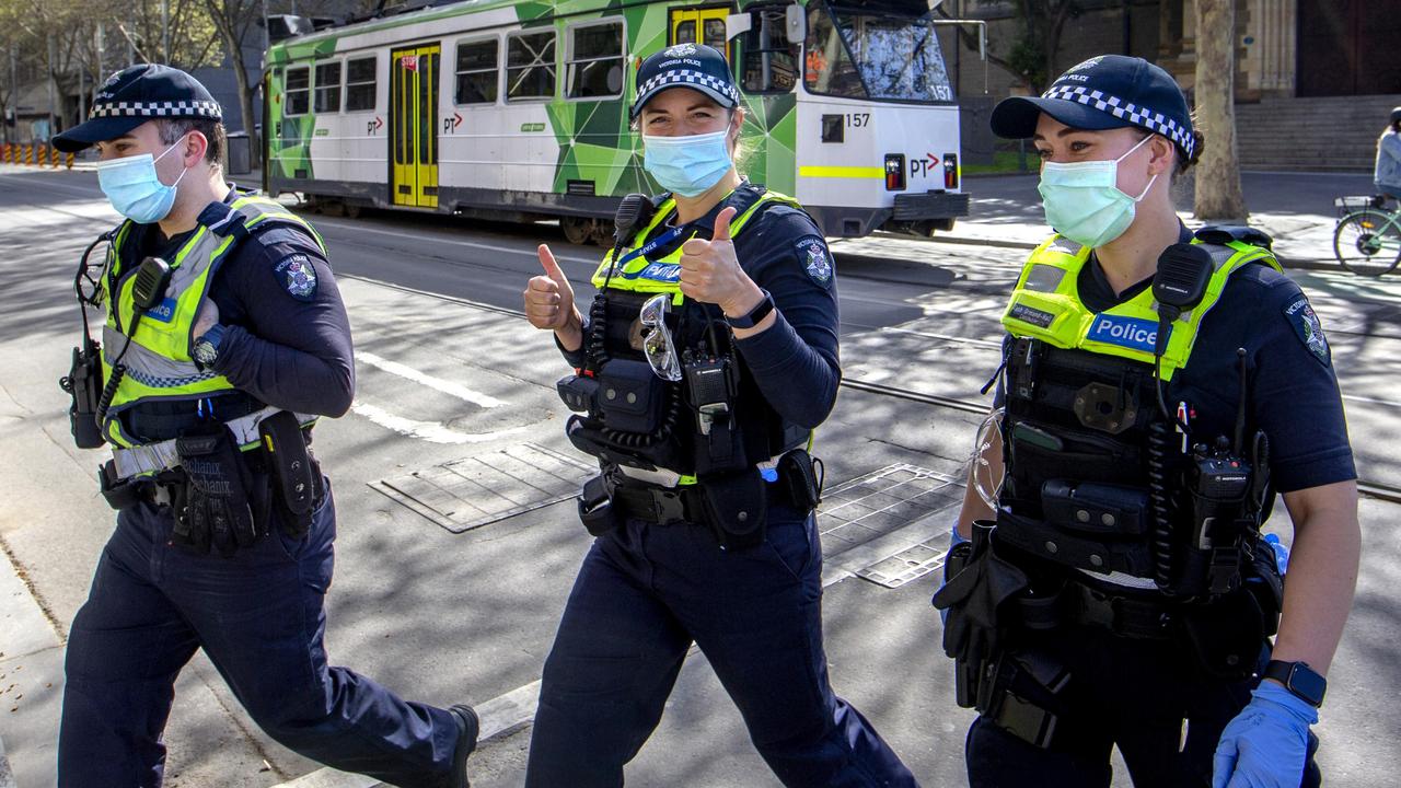 A thumbs up from a police officer patrolling Melbourne CBD during COVID-19 lockdowns. Picture: NCA NewsWire/David Geraghty