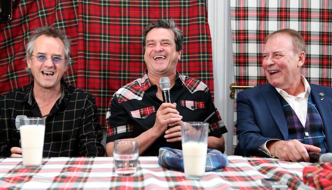 Wood, McKeown and Alan Longmuir toast with milk as they make the announcement of their reunion at Central Hotel in Glasgow in 2015. Formed at the end of the 1960s, the then Scots boy band enjoyed huge success both in the UK and abroad with their distinctive tartan outfits and upbeat pop tunes. Picture: Andrew Milligan/PA Wire