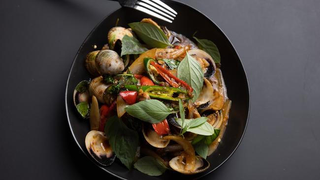 Stir-fried clams with chilli jam dressing. Picture: David Kelly