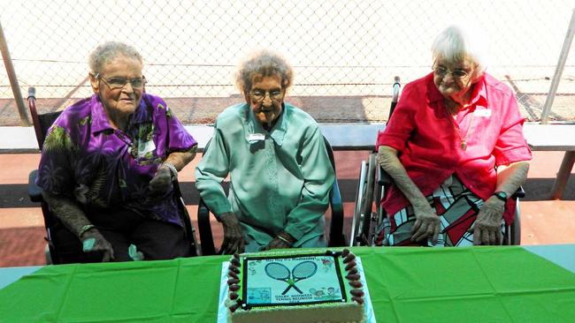 REUNITED: Glenys Brewer 93, Mavis Burns 96 and Kath Keleher 94 cut the cake at the Dalby Ladies Midweek Tennis reunion. Picture: Janet Hutchinson