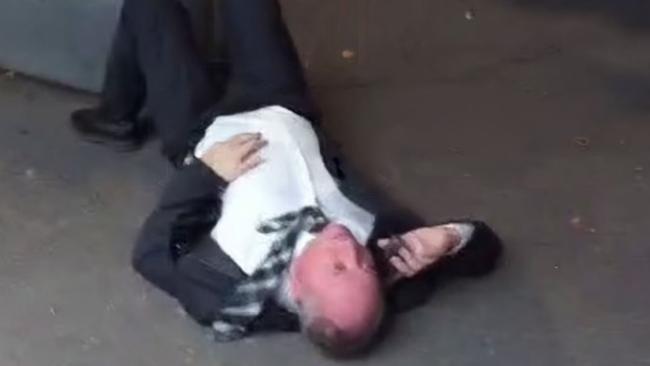 Nationals MP Barnaby Joyce lying on the ground in Canberra. Picture: X