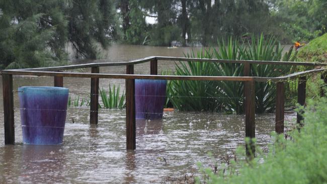 A deck in the backyard of a house on Nepean Ave, Penrith, underwater just before 2pm on Sunday.