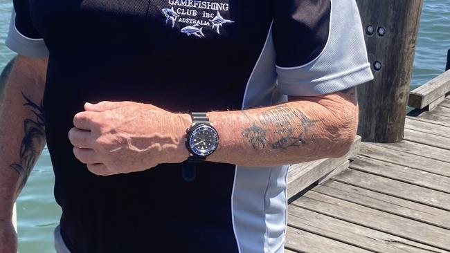 Fishing through and through. Mark Way showing off his Kiama Game Fishing tattoo. Photo: Kevin Merrigan