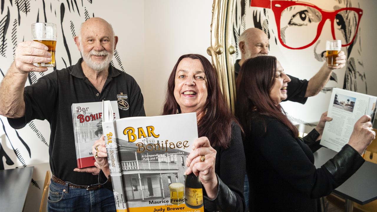 Bar and Boniface: A Compendium of Toowoombas Pubs and Publicans 1844-2020 co-authors Maurice French and Judy Brewer in front a mirror from the historic Brisbane Bellevue at the Stock Hotel, Monday, June 20, 2022. Picture: Kevin Farmer