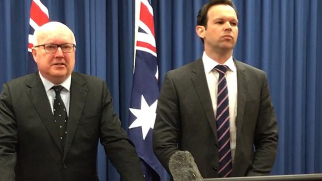 Federal Resources Minister Matt Canavan and Attorney-General George Brandis as Mr Canavan announces he’ll be departing the cabinet. Picture: AAP