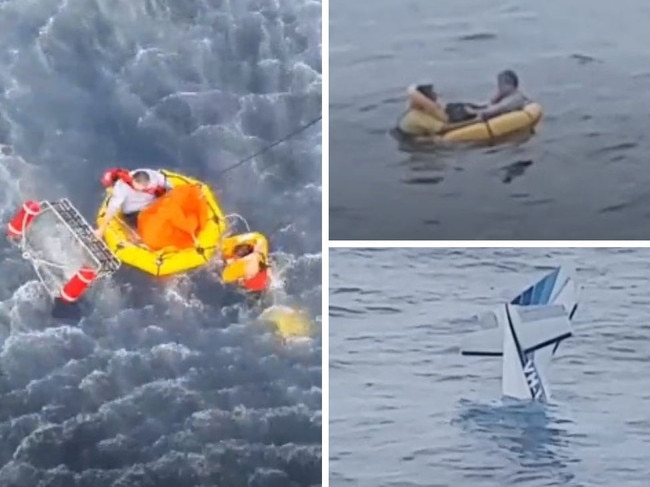 The dramatic moment two men are winched to safety from a plane crash. Photo: RACQ Lifeflight