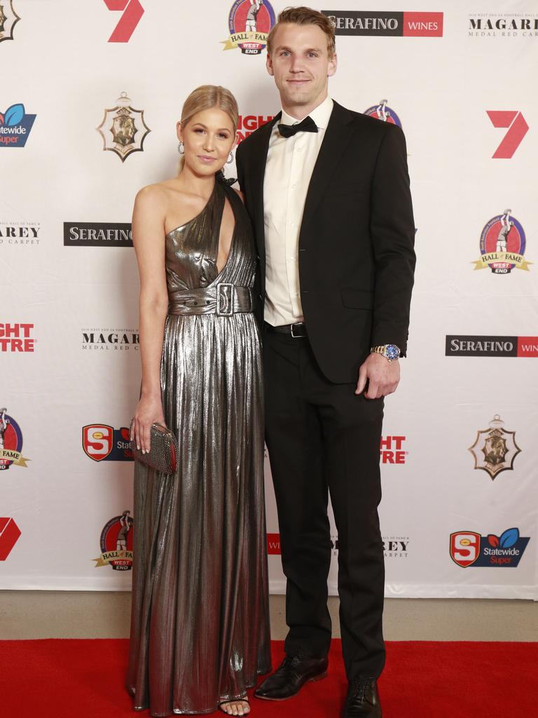 Carlea Atkins wearing Retrofete, and Trent McKenzie pose for a picture on the red carpet at Adelaide Oval in North Adelaide, for the Magarey Medal, Monday, September 9, 2019. Picture: Matt Loxton