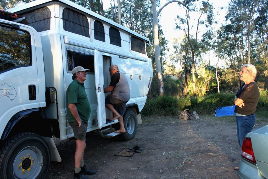 Tony Bates shows motohome 'Isabel' to interested fellow travellers.