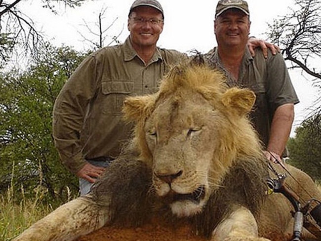 Avid hunter ... Walter Palmer (left) with one of his previous trophies. Photo: Cacebook.