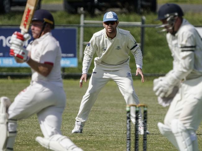 Ian Cockbain (centre) playing for Langwarrin last season. Picture: Valeriu Campan