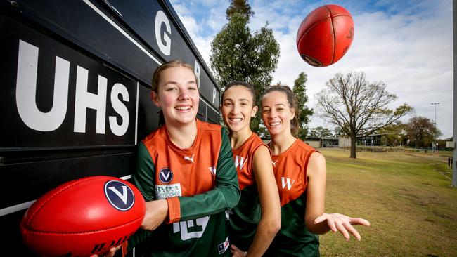 Uni Hill Amateur Football Club players Lily Ingram, Anna Theris and Angelica Vaira. Their club’s rooms will be funded. Picture: Nicole Cleary