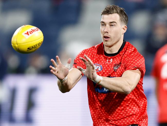 GEELONG, AUSTRALIA - JULY 15: Zach Merrett of the Bombers warms up during the 2023 AFL Round 18 match between the Geelong Cats and the Essendon Bombers at GMHBA Stadium on July 15, 2023 in Geelong, Australia. (Photo by Michael Willson/AFL Photos via Getty Images)