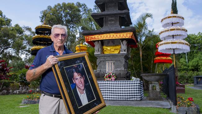 Geoff Thwaites at the Bali Memorial in Nerang. Pictured with a photo of his son Robert Thwaites who died in the 2002 Bali bombings. Picture: Jerad Williams