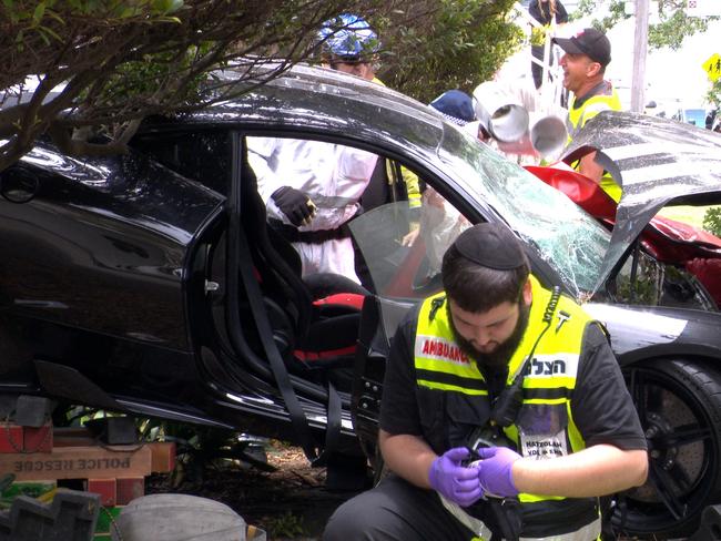 The CEO of a packaging company was behind the wheel of a Ferrari which crashed into the wall of a harbourside home. Picture: OnScene Bondi