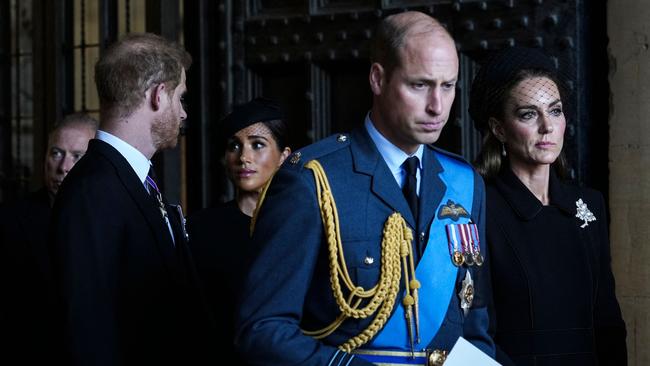 Catherine (R), Princess of Wales, 's Prince William (2nd R), Prince of Wales, 's Prince Harry (L), Duke of Sussex, and Meghan (2nd L), Duchess of Sussex, leave after paying their respects at Westminster Hall where the coffin of Queen Elizabeth II, lies in State.