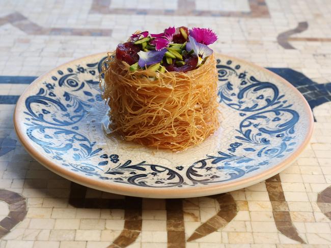 Kataifi ashta - caramelised shredded filo, sweet cream, rosewater syrup, pistachio, Byblos restaurant Portside Wharf. Picture: Liam Kidston