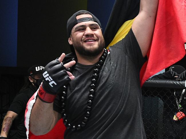 Australian UFC fighter Tai Tuivasa.,  LAS VEGAS, NEVADA - MARCH 20: Tai Tuivasa of Australia reacts after his victory over Harry Hunsucker in their heavyweight fight during the UFC Fight Night event at UFC APEX on March 20, 2021 in Las Vegas, Nevada. (Photo by Chris Unger/Zuffa LLC via Getty Images)