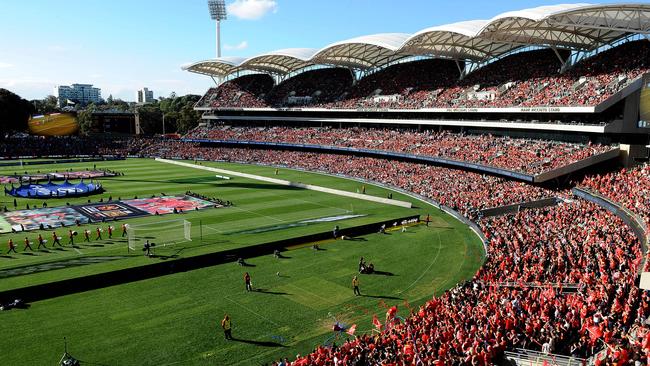 Adeliade United fans turn Adelaide Oval into a sea of red, ahead of the 2016 A-League decider against Western Sydney Wanderers. Picture: Keryn Stevens