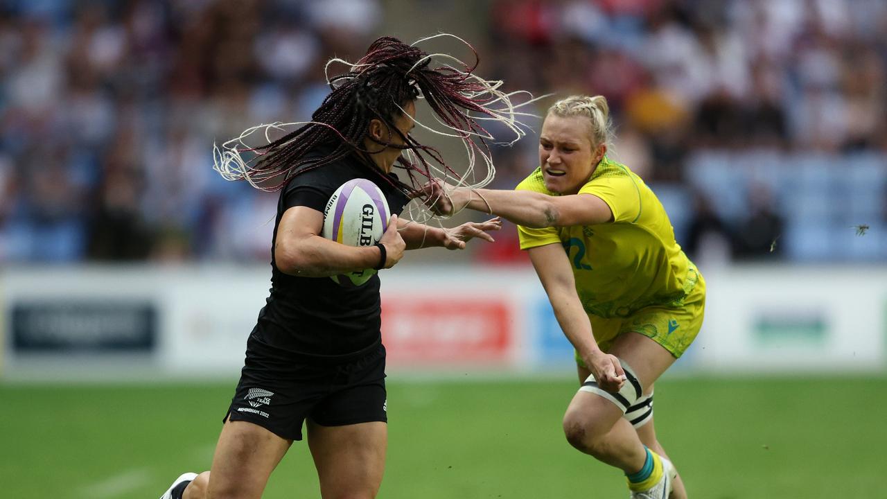 She was trying to grab anything but the hair. Photo by Richard Heathcote/Getty Images