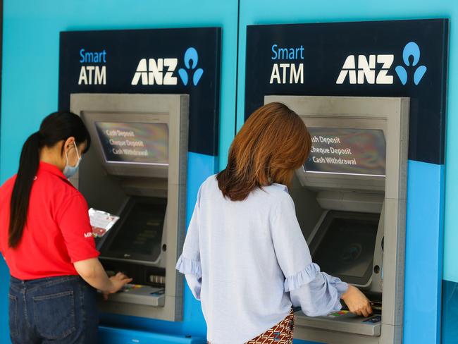 SYDNEY, AUSTRALIA - NewsWire Photos - NOVEMBER 11 2020: A view of young women using an ANZ Bank ATM in the CBD in Sydney Australia. Picture: NCA NewsWire / Gaye Gerard