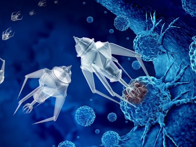 Nanotechnology medical treatment and future medicine concept as a group of microscopic nano robots or nanobots programed to kill cancer cells or human disease as a futuristic health care cure symbol as a 3D render. Picture: iStock