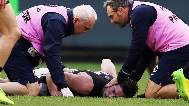 Jed Lamb after his hit from Bachar Houli. Picture: Michael Klein