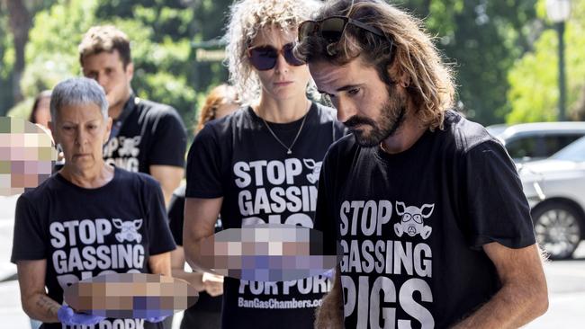 ***BLURRED VERSION***MELBOURNE, AUSTRALIA - NewsWire Photos - January 21, 2025: Animal activists have placed dead piglets outside the Victorian State Government offices at treasury place.  Picture: NewsWire / David Geraghty ,