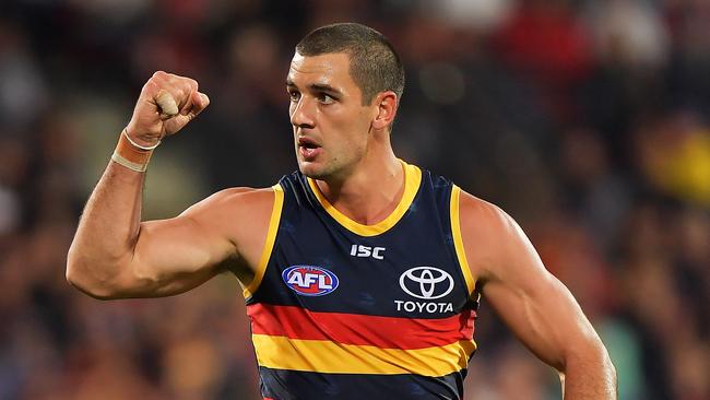 Crows captain Taylor Walker celebrates after kicking one of his four goals against Richmond on Thursday. Picture: Daniel Kalisz/Getty Images