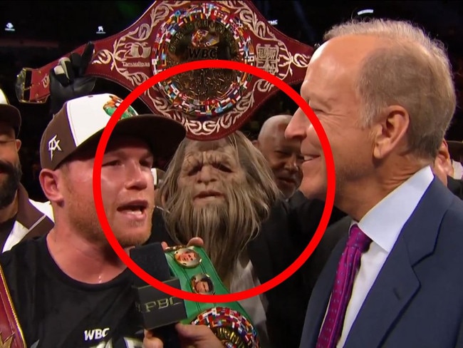 A bizarre character held the belt after Canelo's victory.