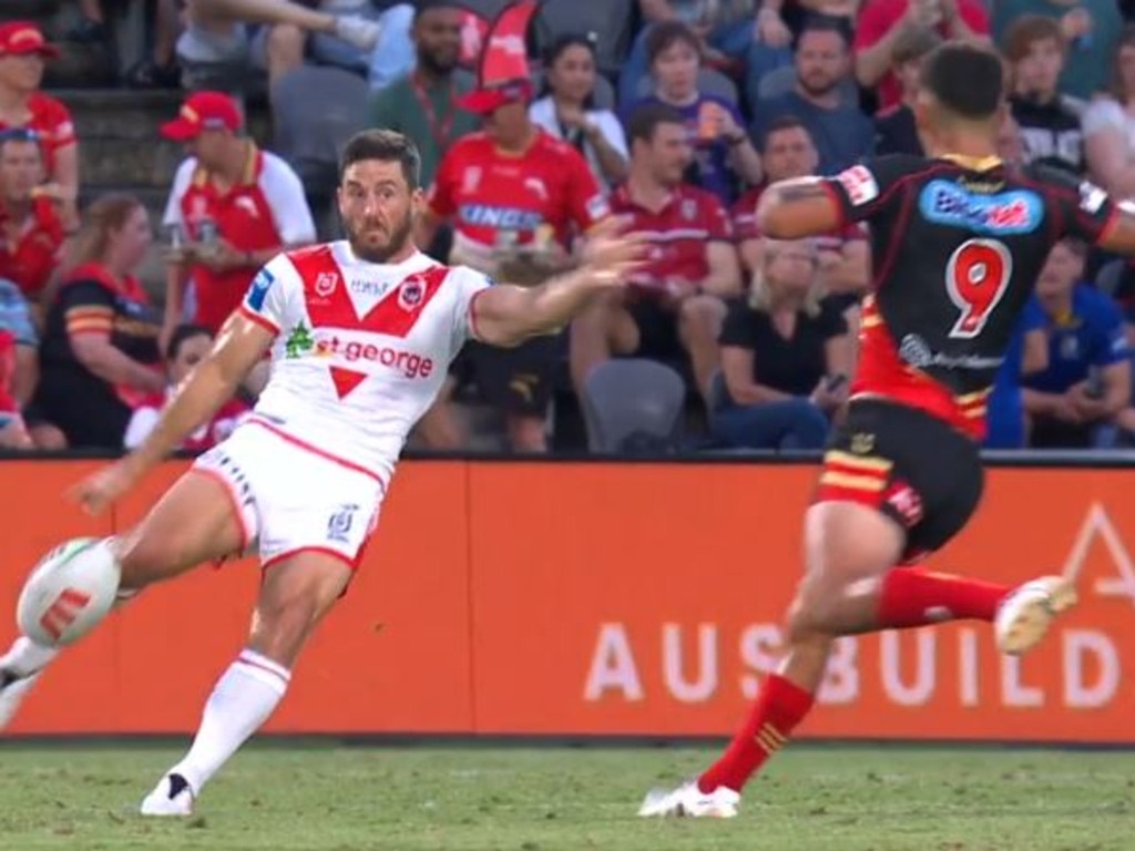 Ben Hunt takes the kick as Marshall-King rushes towards him.