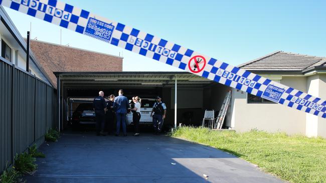 A crime scene was established at the Georges Hall property. Picture: Gaye Gerard