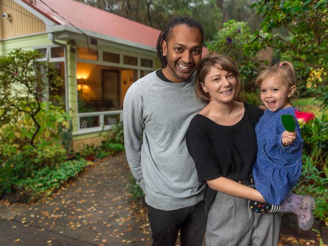 New Melbourne homeowners Sanka Nanayakkara and Tammy Knox with, daughter Myla, are hoping that the bank passes the rate cut onto customers. Picture: Jason Edwards