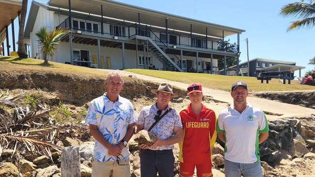 From left: Livingstone Shire councillors Pat Eastwood and Adam Belot with Emu Park Surf Lifesaving Club captain Brittany Hooton and club president Craig Beevers (clubhouse in background). Photo: Darryn Nufer.