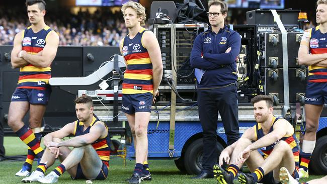 (From left) Taylor Walker, Rory Atkins, Rory Sloane, David Teague, Andy Otten and Hugh Greenwood watch on during the premiership presentation. Picture: Sarah Reed