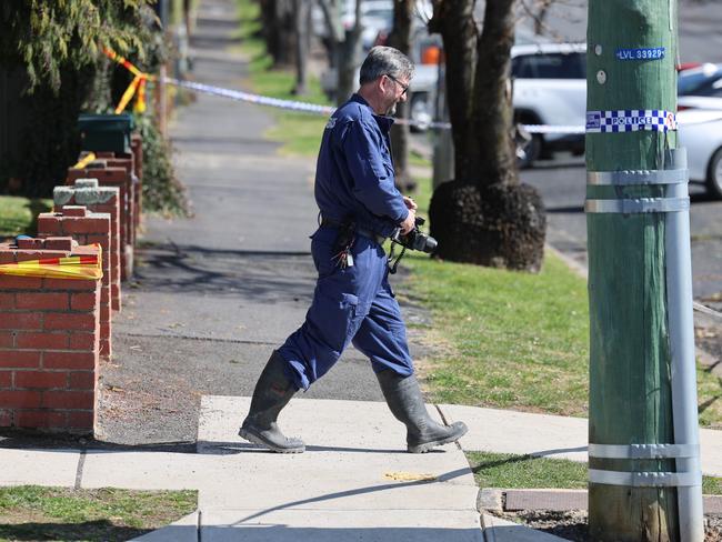 Police establish a crime scene at Orange after the latest arson attack. Picture: Rohan Kelly