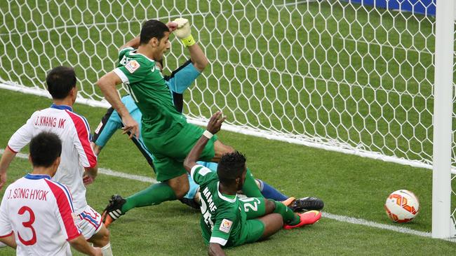 Asian Cup match, Group B, North Korea v Saudi Arabia at the Melbourne Rectangular Stadium. Melbourne Australia 14th January. Nawaf Al Abid of Saudi Arabia scores after hos penalty was saved by Ri Myong-Guk of North Korea . Picture : George Salpigtidis