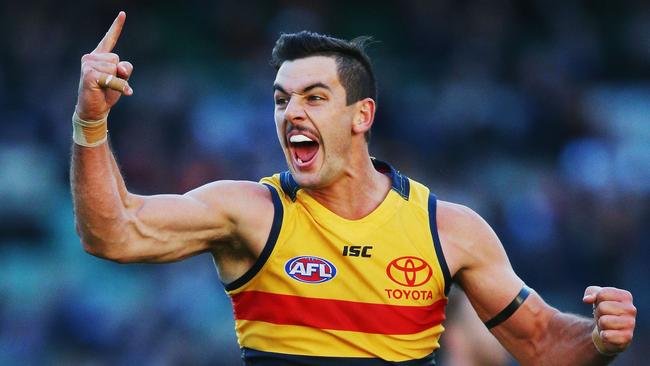 Taylor Walker of the Crows celebrates an important goal during his team’s win over Carlton at the MCG. Picture: Michael Dodge (Getty Images)