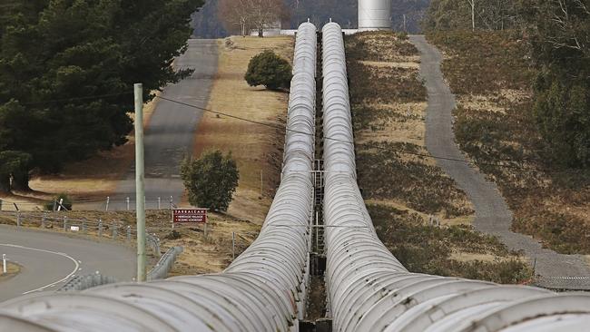 Hydroelectric water pipes snake toward a Tasmanian hydro power station. Picture: Mathew Farrell